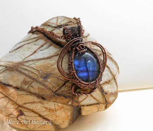 Wire wrapped oxidized copper pendant / fire labradorite