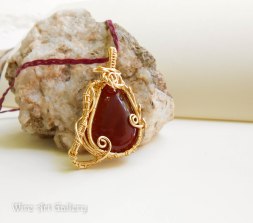 Wire wrapped enameled gold pendant / Carnelian Agate